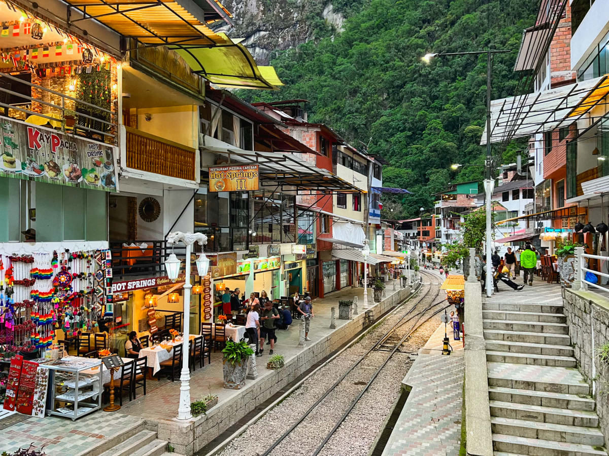 Downtown Aguas Calientes in Peru with railroad in the street