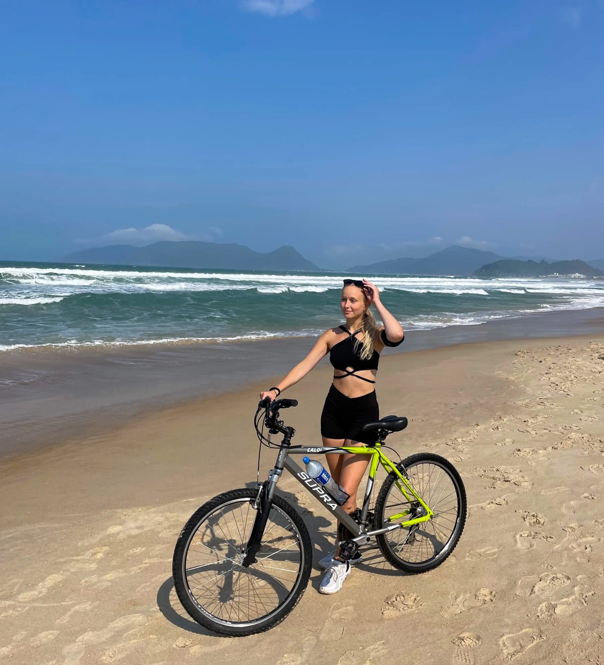 Biking on Campeche Beach in Florianópolis on Santa Catarina Island in Brazil