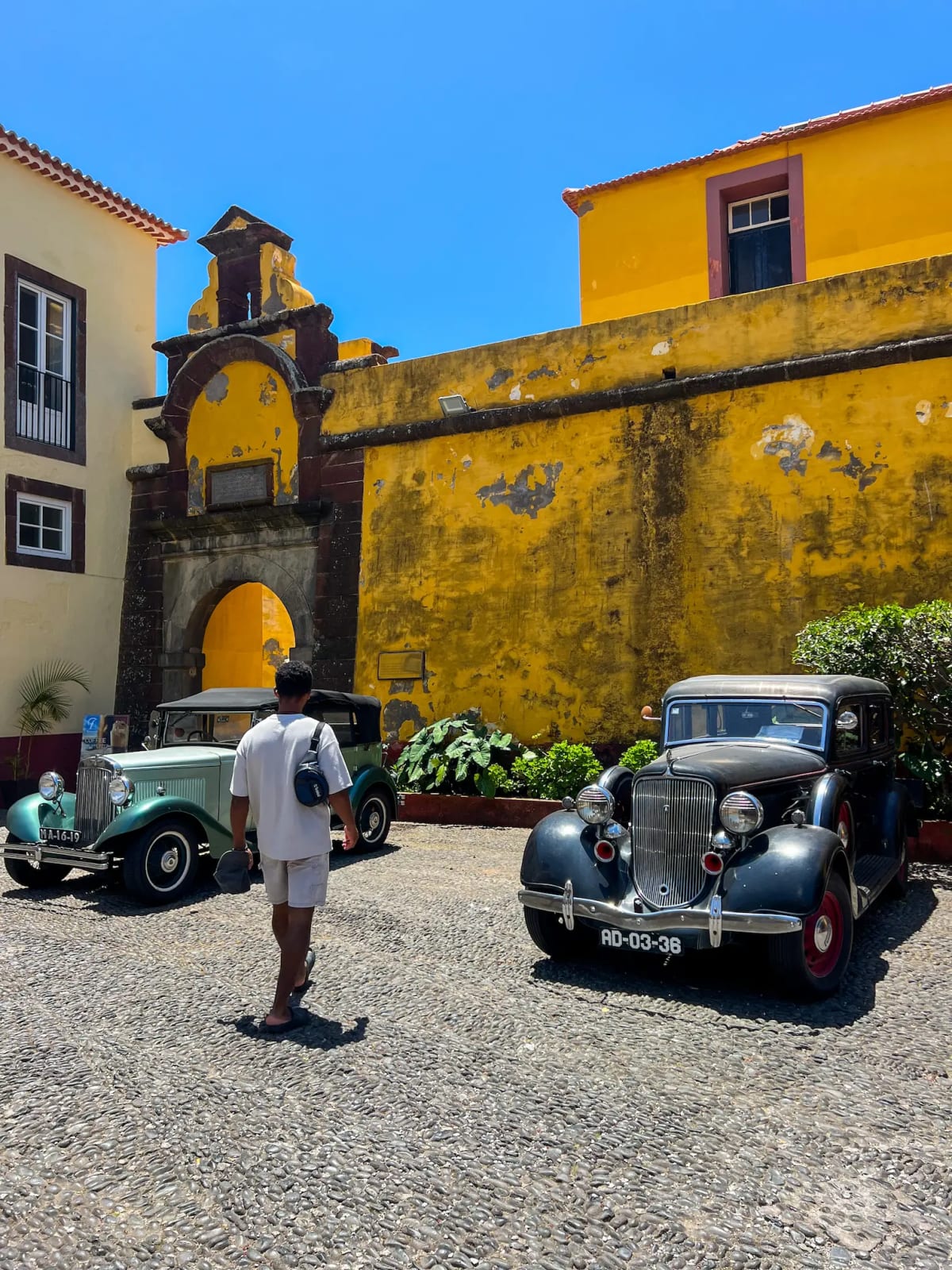 Vintage cars outside the historic fort of São Tiago in Funchal on Madeira Island