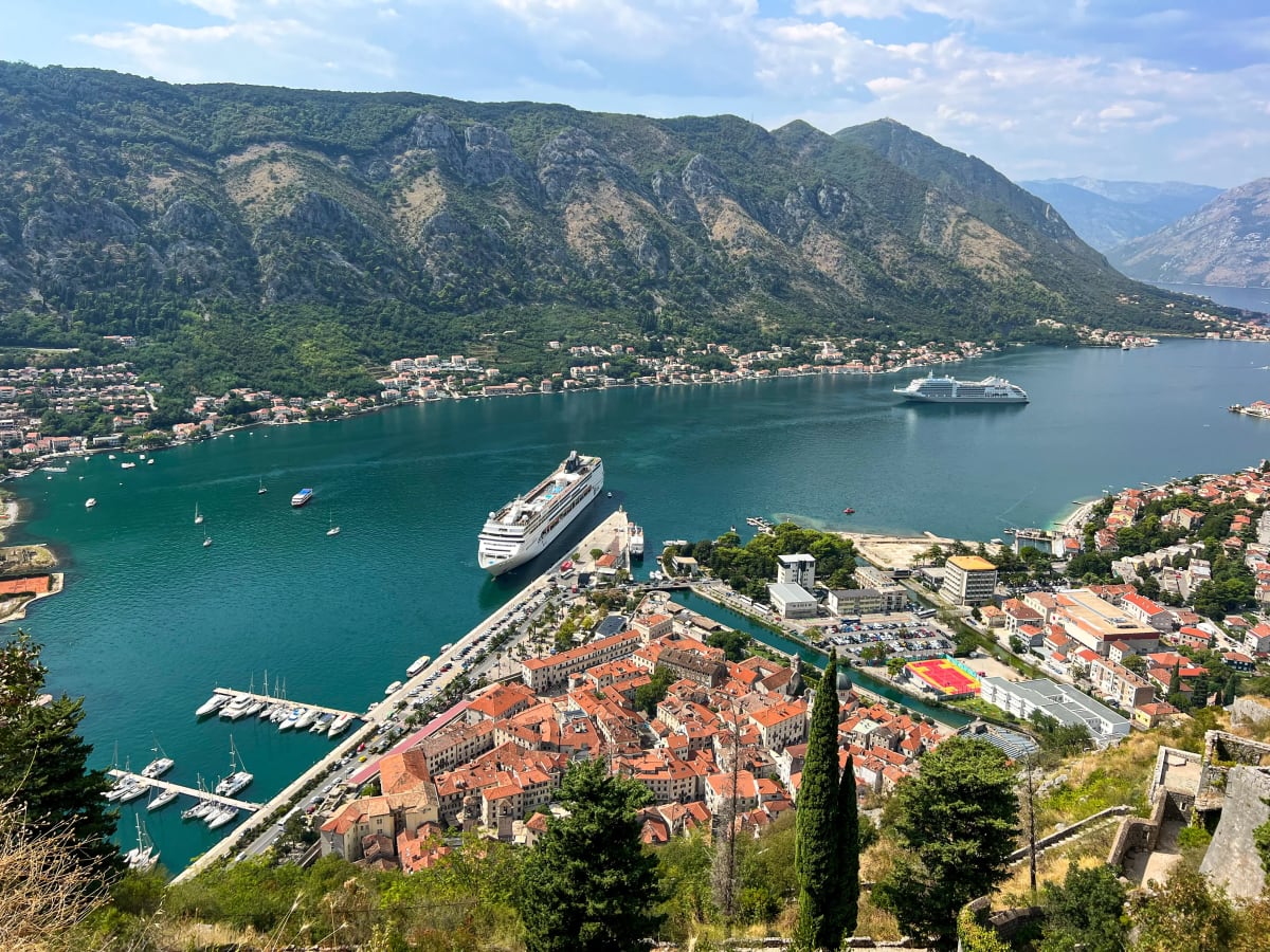 Climbing into the window of the Fortress of Kotor in Kotor Montenegro