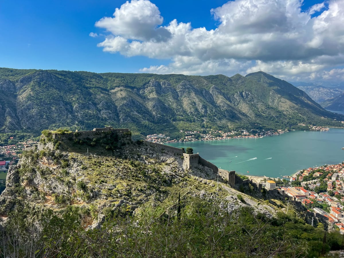 Climbing into the window of the Fortress of Kotor in Kotor Montenegro