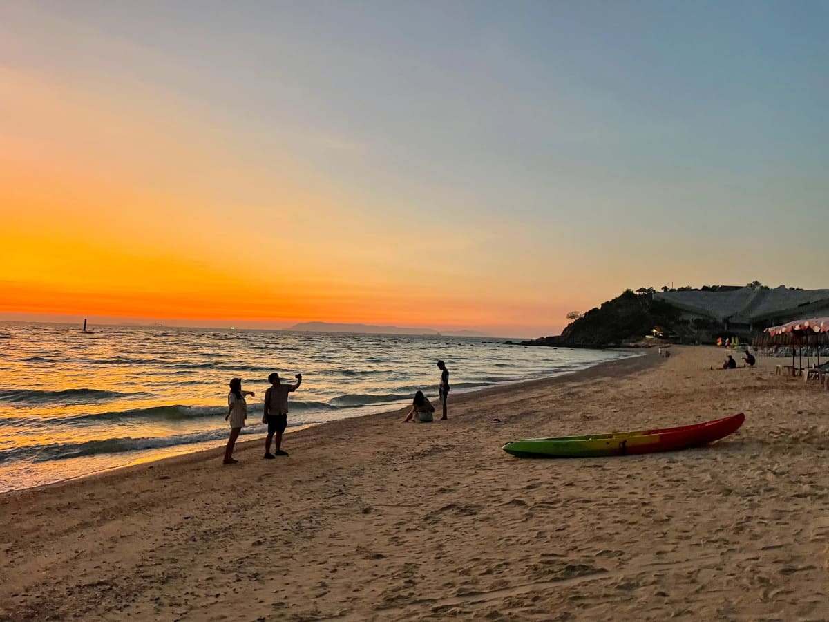 A vibrant sunset on a beach on an island in Thailand