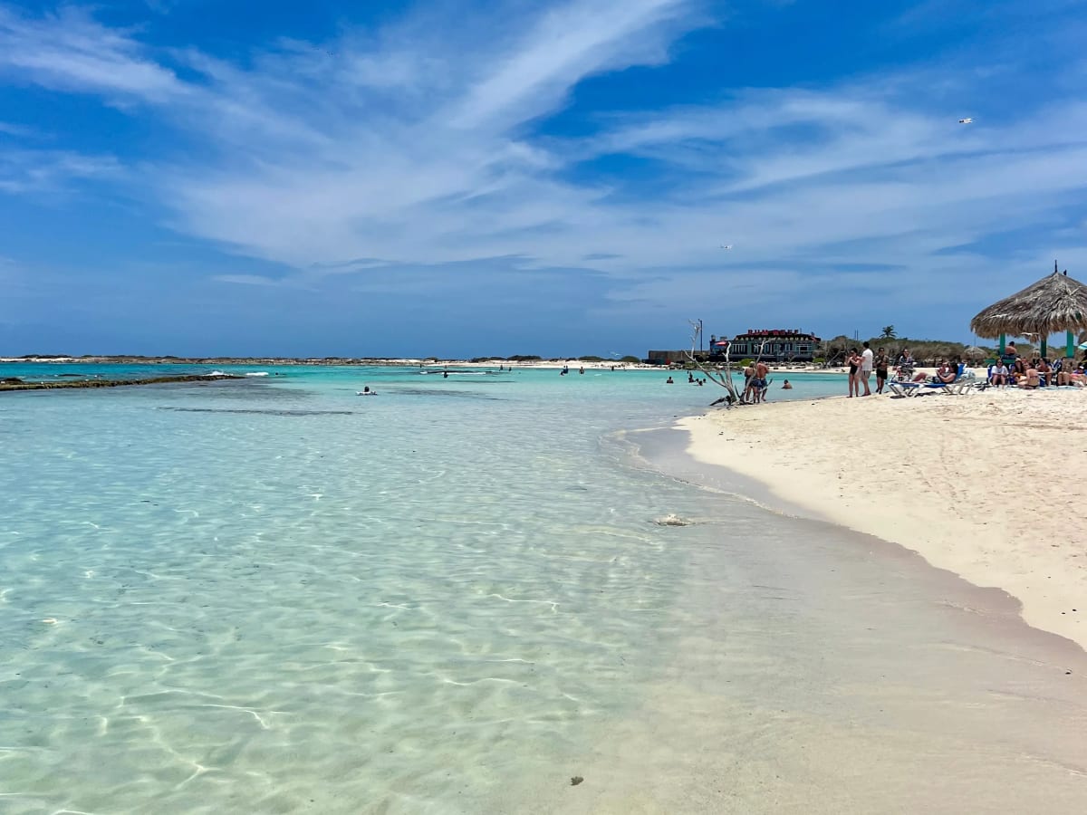 Clear water and white sand at Baby Beach in Aruba