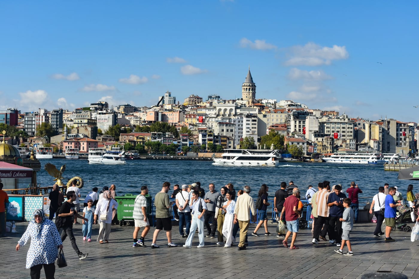 Eminönü Square with views of the Galata Tower across the Golden Horn inlet in Istanbul