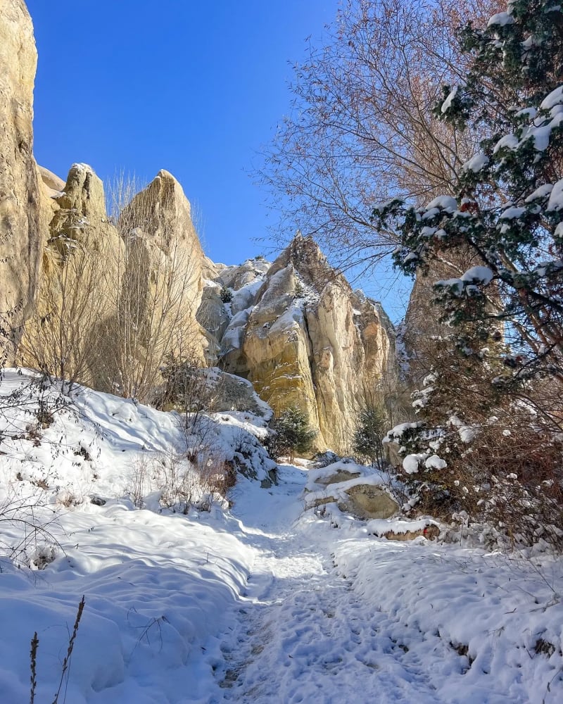 Snowy hiking trail through Red Valley in Göreme Cappadocia Turkey in the winter