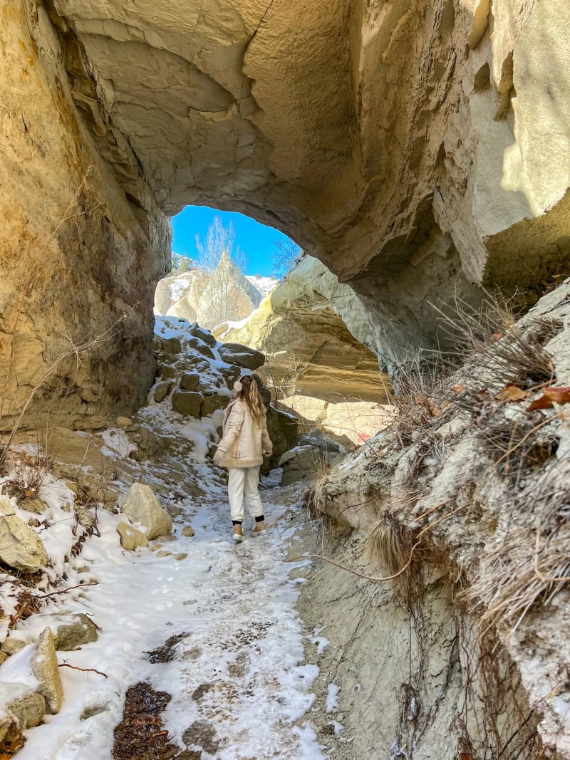 Snowy cave along a Red Valley hiking trail in Göreme, Cappadocia, Turkey in the winter