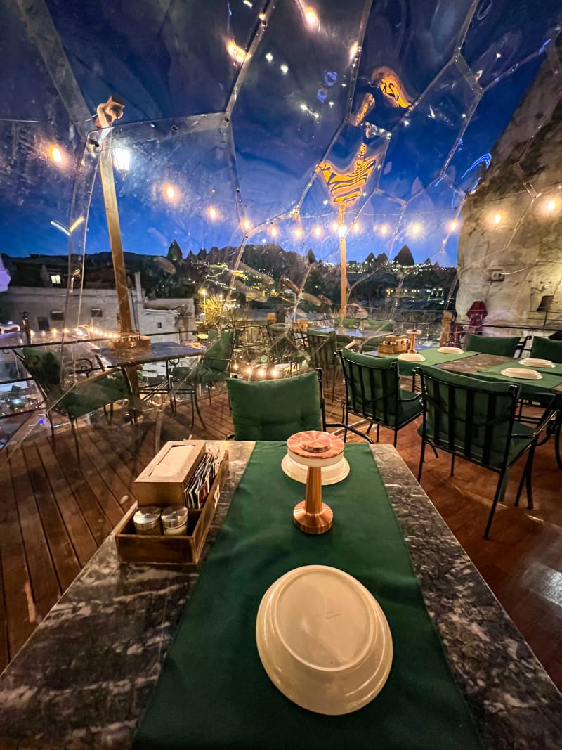 Restaurant in a glass igloo in Göreme, Cappadocia, Turkey, at night in the winter