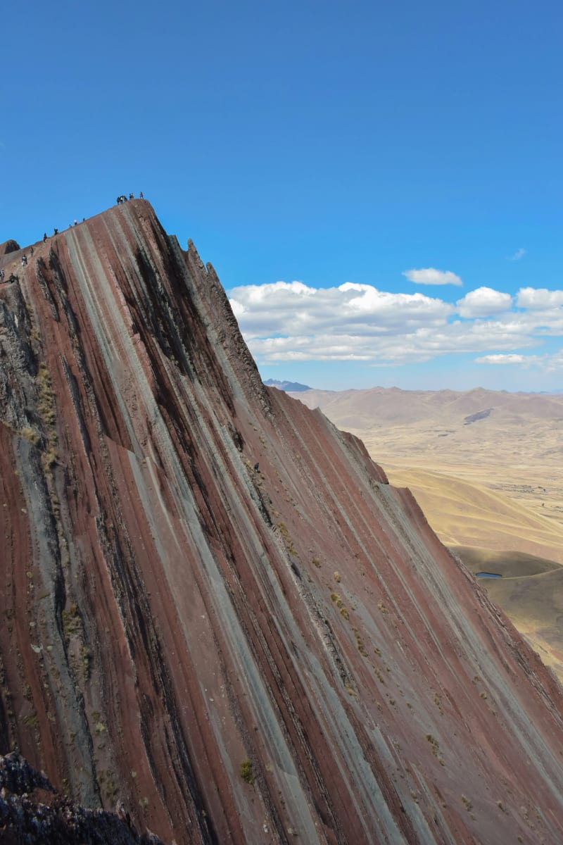 Pallay Punchu rainbow mountain in Peru