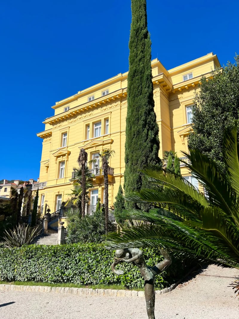 A large yellow villa along the coast of Opatija, Croatia