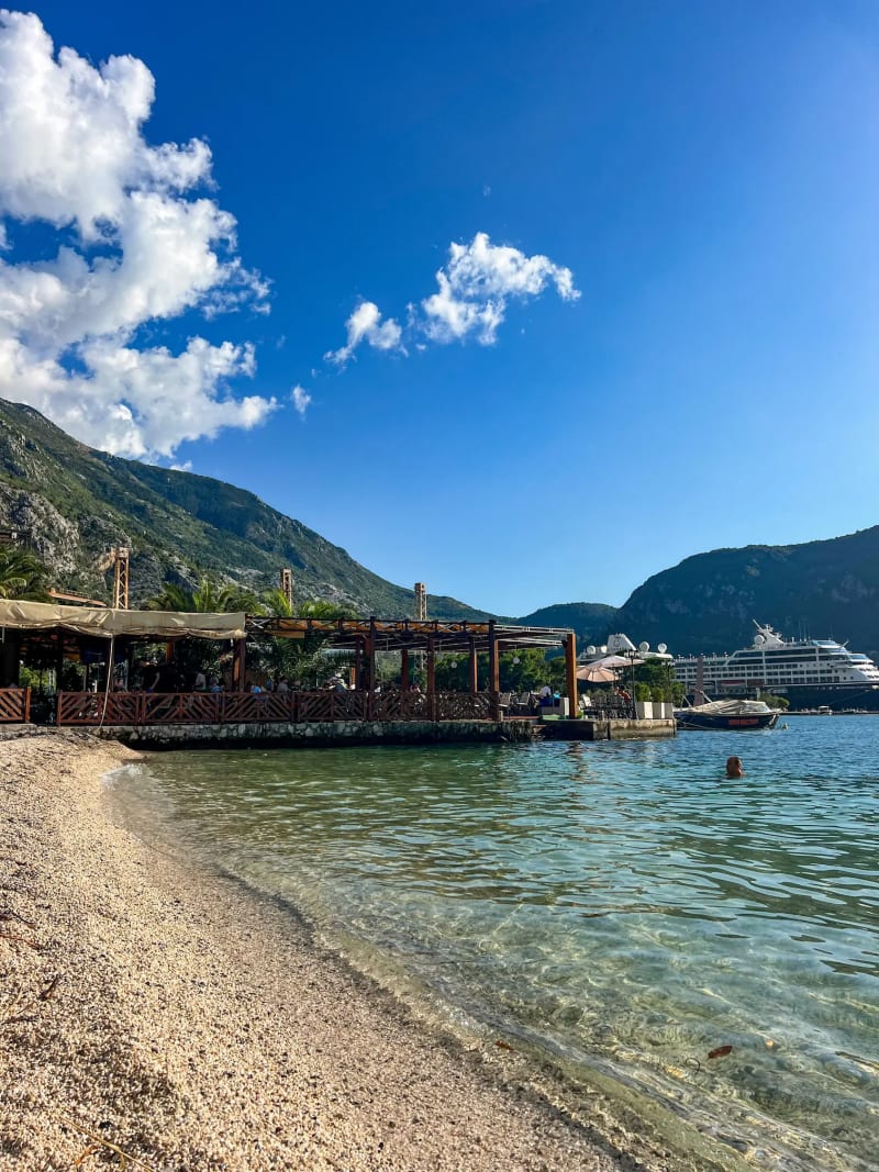 Kotor beach in Montenegro with clear waters and mountains