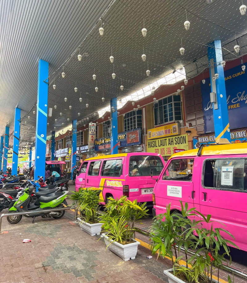 Pink taxis on Pangkor Island in Malaysia