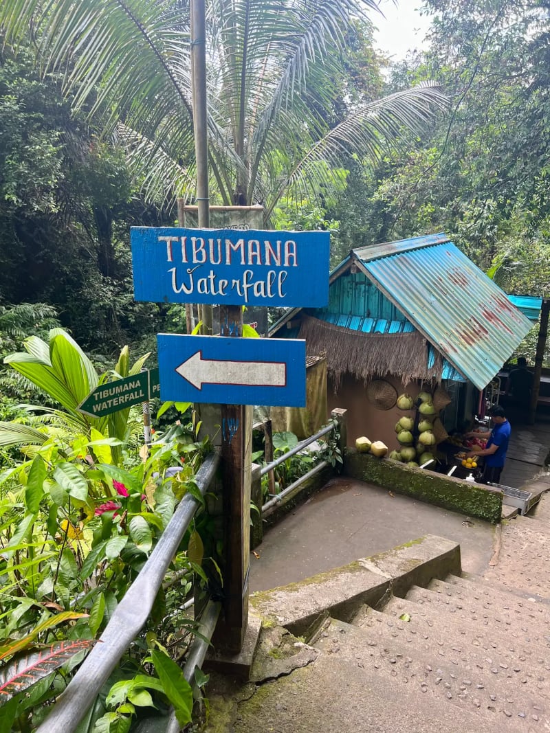 Signage and path leading to Tibumana waterfall Bali, Indonesia