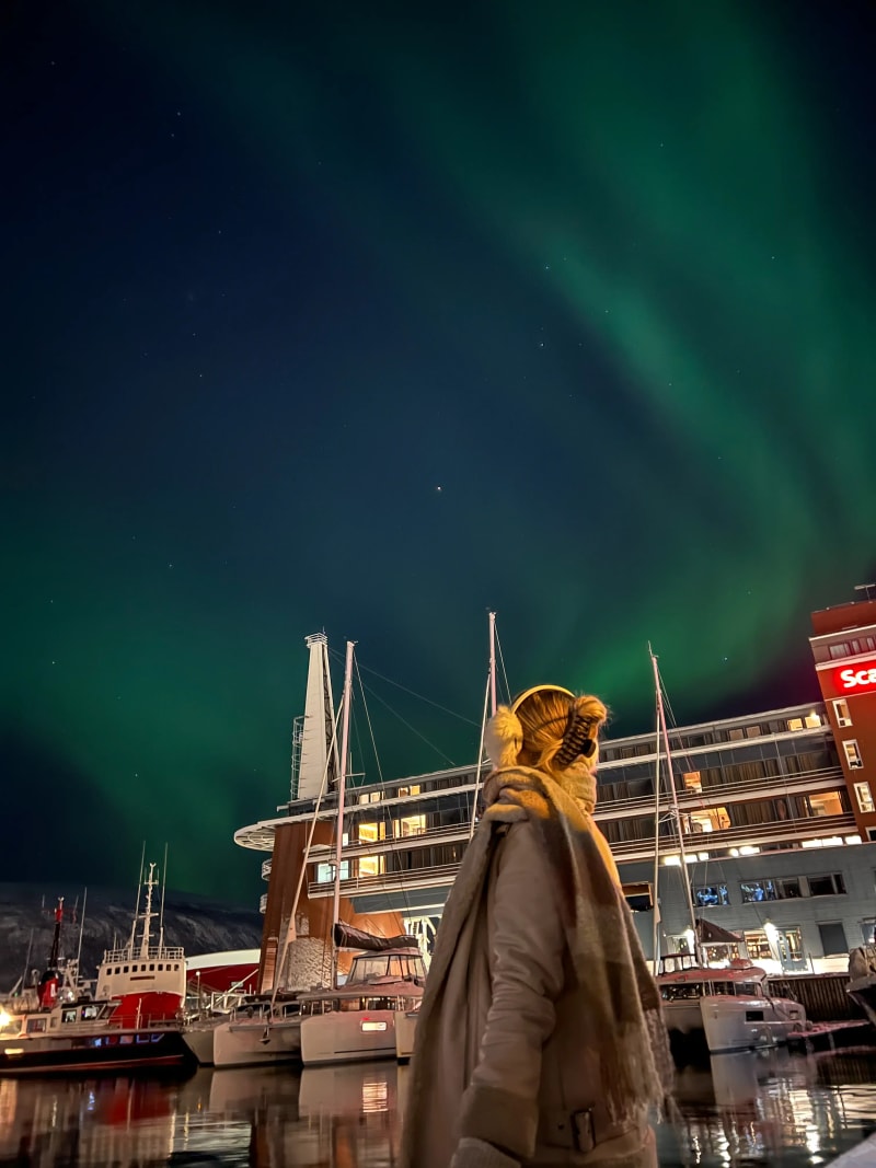 The northern lights (aurora borealis) over Tromsø Centrum in Norway