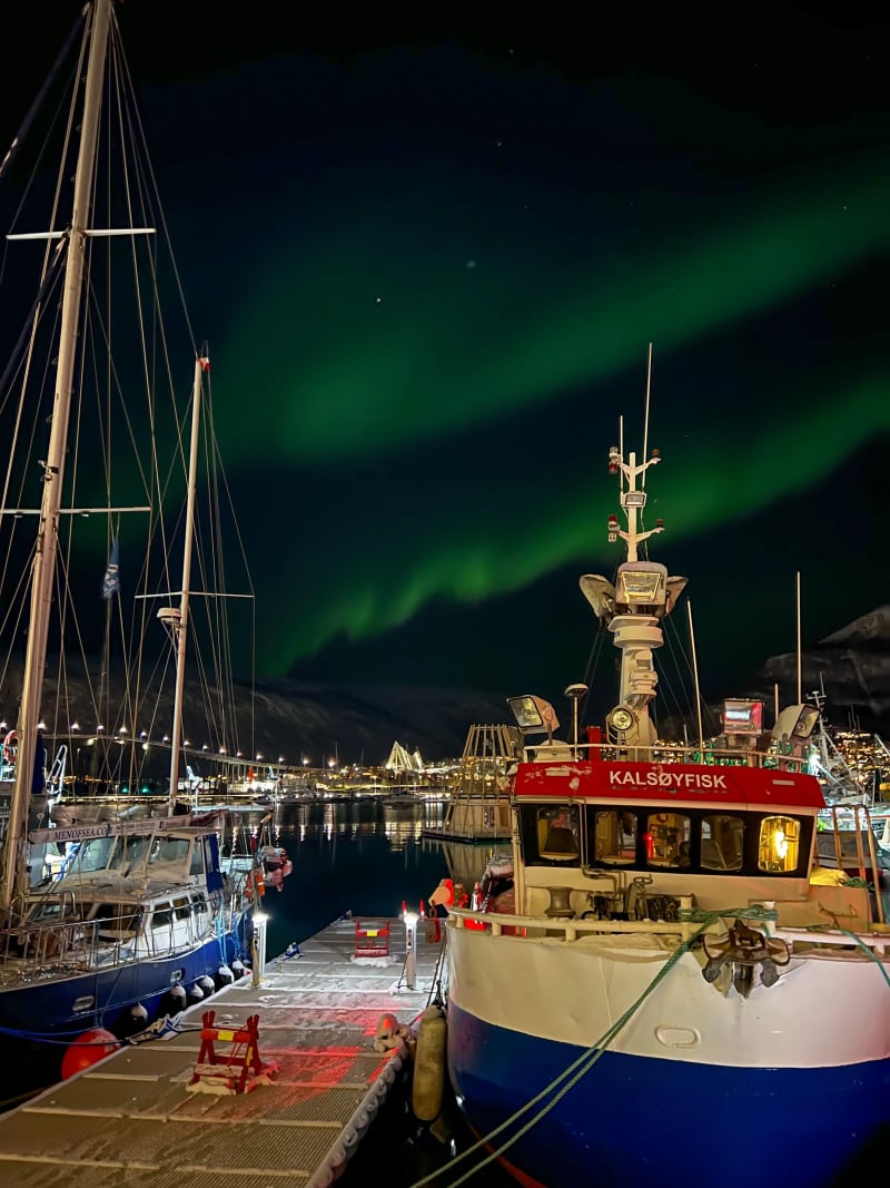 The northern lights (aurora borealis) over Tromsø Centrum in Norway