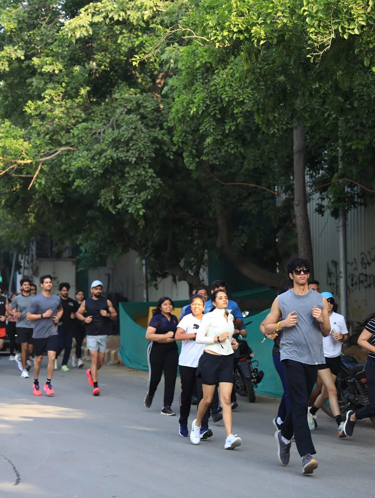 Participants warming up together at a FindYourFit Wellness Carnival morning