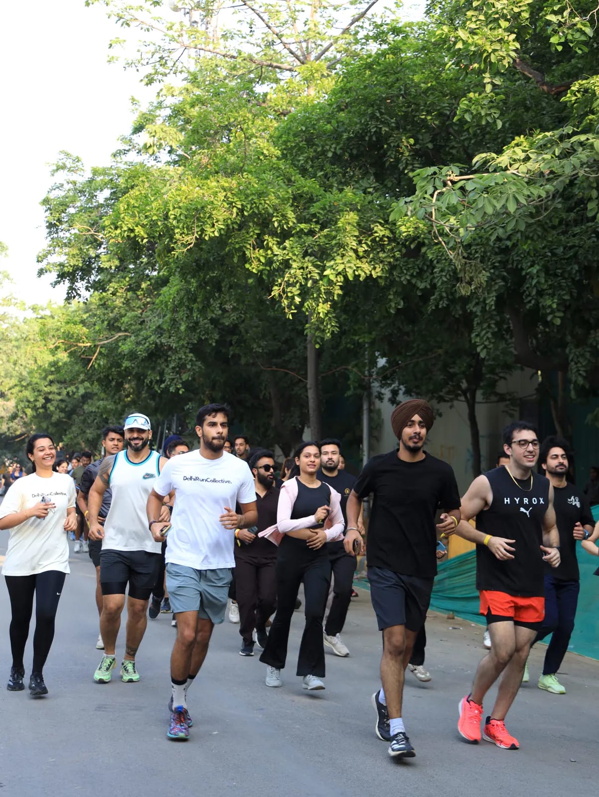 Community fitness in the park at a FindYourFit Wellness Carnival morning