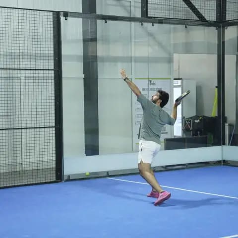 Indoor padel action at a FindYourFit tournament