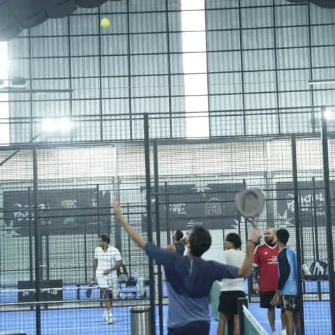 Indoor padel action at a FindYourFit tournament