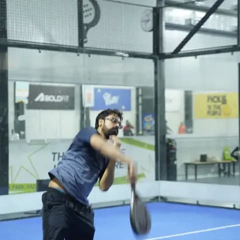 Indoor padel action at a FindYourFit tournament