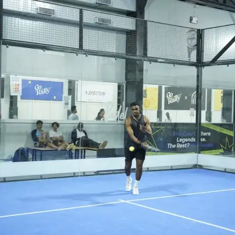 Indoor padel action at a FindYourFit tournament
