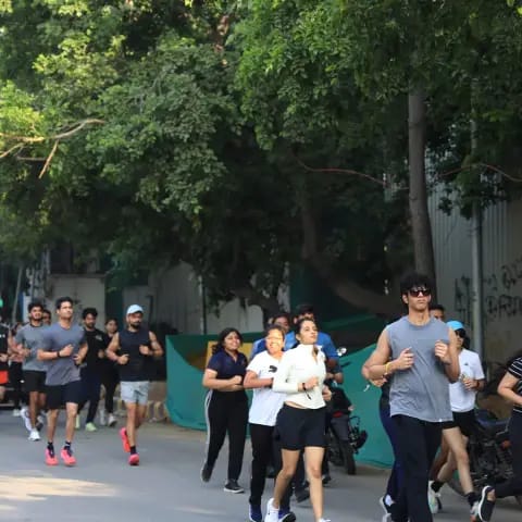 Participants warming up together at The Wellness Carnival