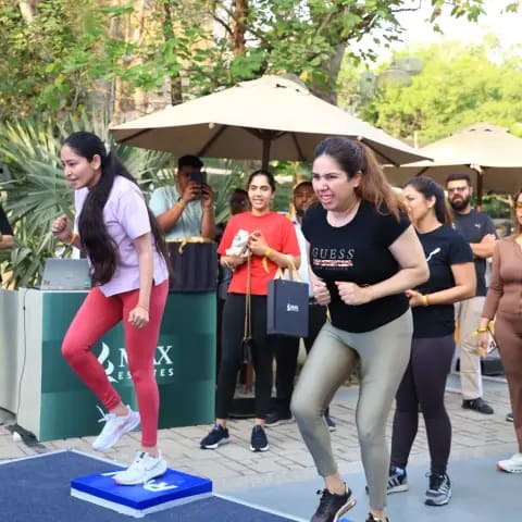 Community fitness in the park at The Wellness Carnival