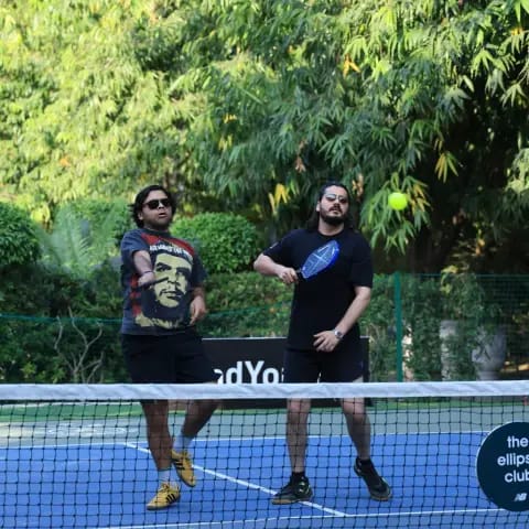 Players rallying at a FindYourFit pickleball & padel night