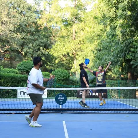 Players rallying at a FindYourFit pickleball & padel night