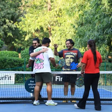 Players rallying at a FindYourFit pickleball & padel night