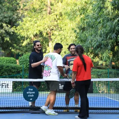 Players rallying at a FindYourFit pickleball & padel night