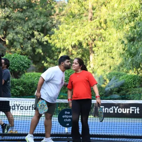 Players rallying at a FindYourFit pickleball & padel night
