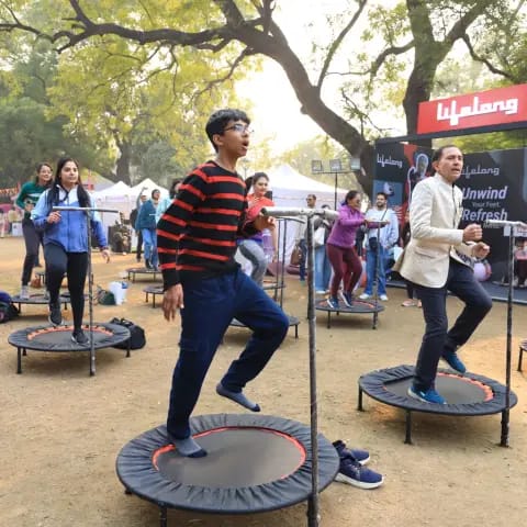 Participants warming up together at The Wellness Carnival