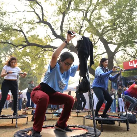 Participants warming up together at The Wellness Carnival