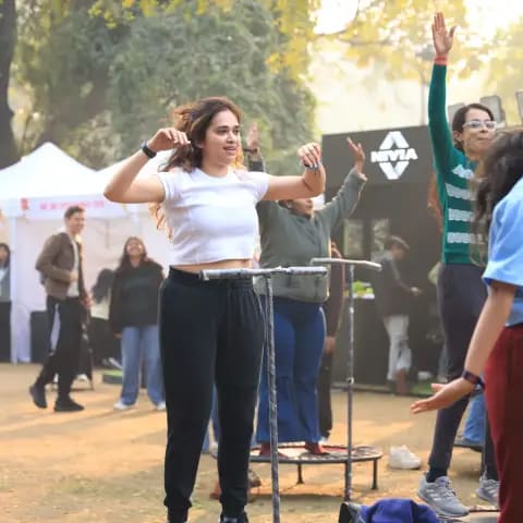 Participants warming up together at The Wellness Carnival