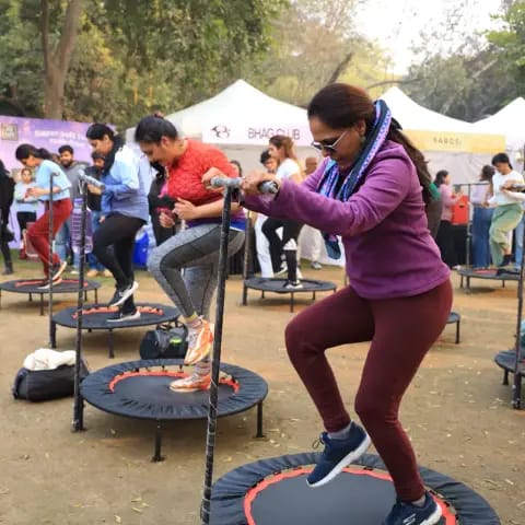 Participants warming up together at The Wellness Carnival