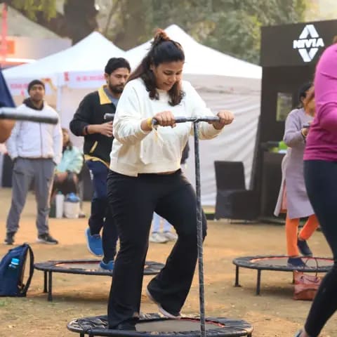 Participants warming up together at The Wellness Carnival
