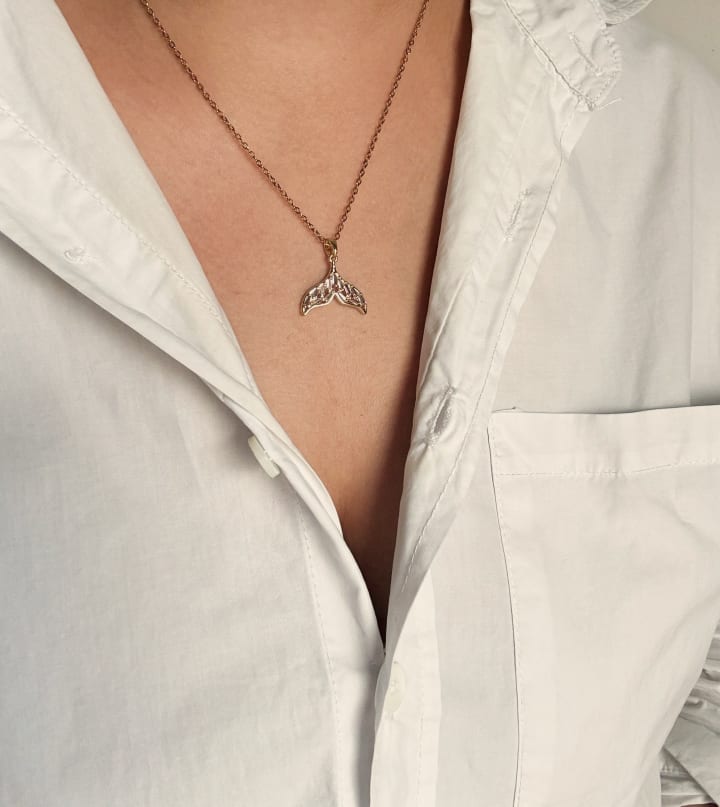 Delicate Golden Fishtail Charm