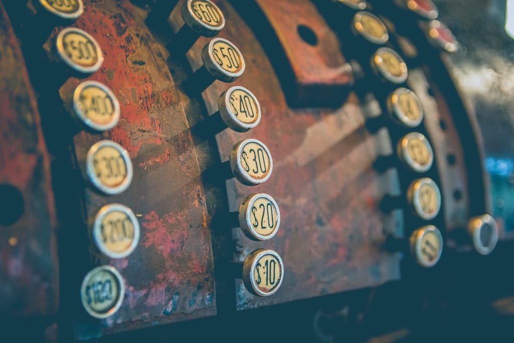 close up photo of an antique cash register