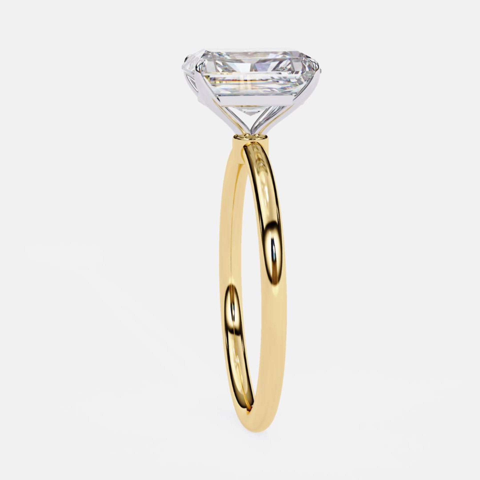Classic Emerald Solitaire Ring