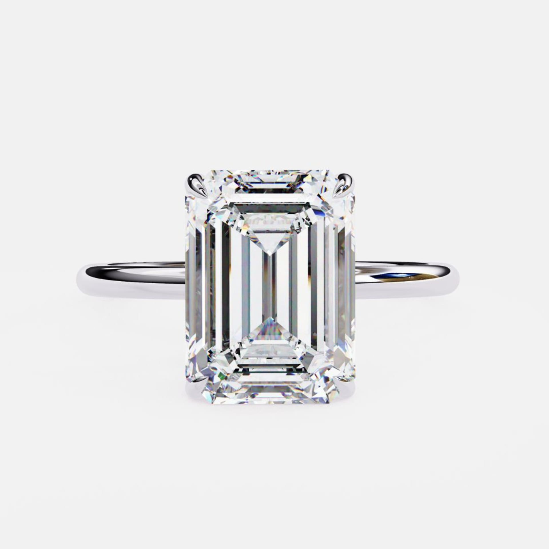 Classic Emerald Solitaire Ring