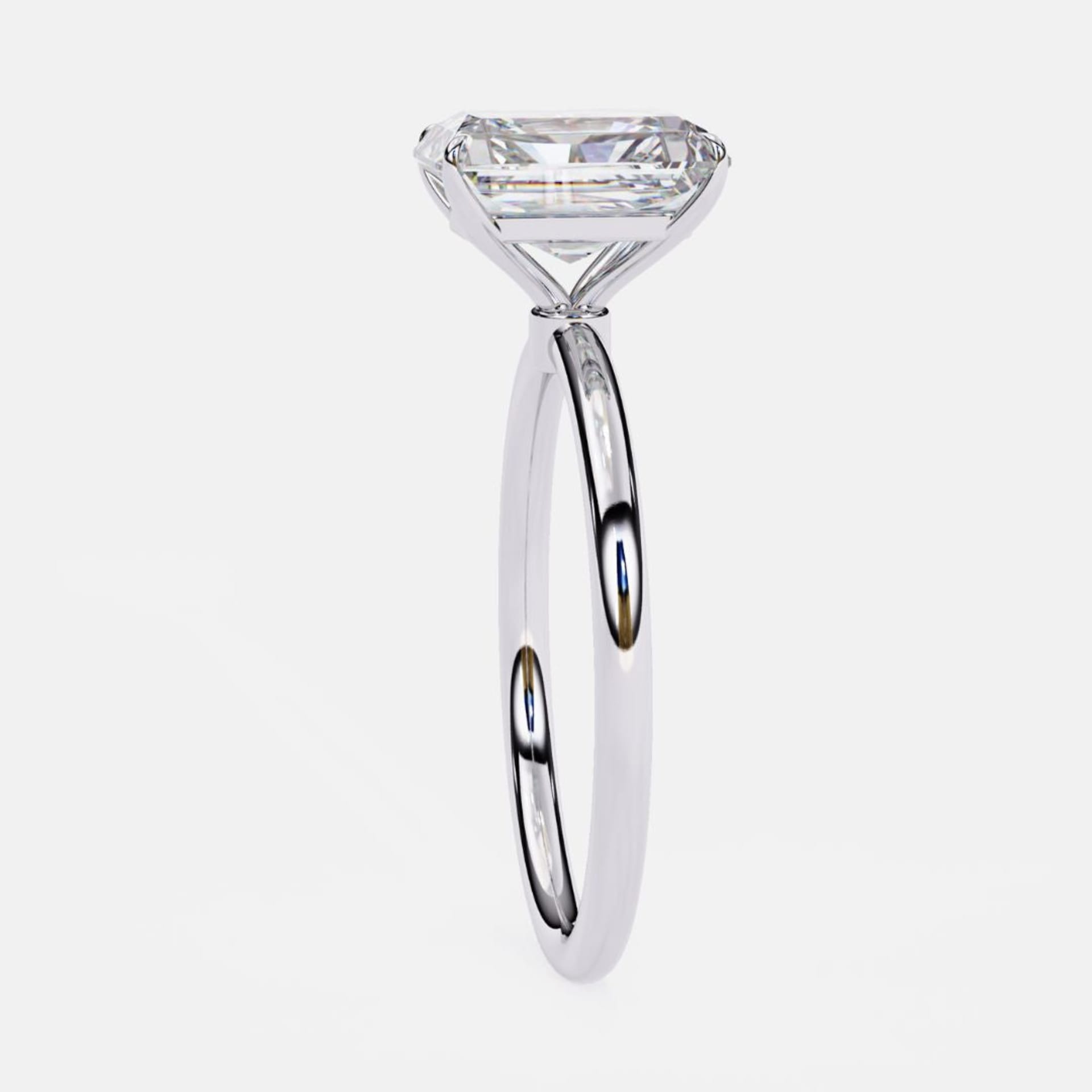 Classic Emerald Solitaire Ring
