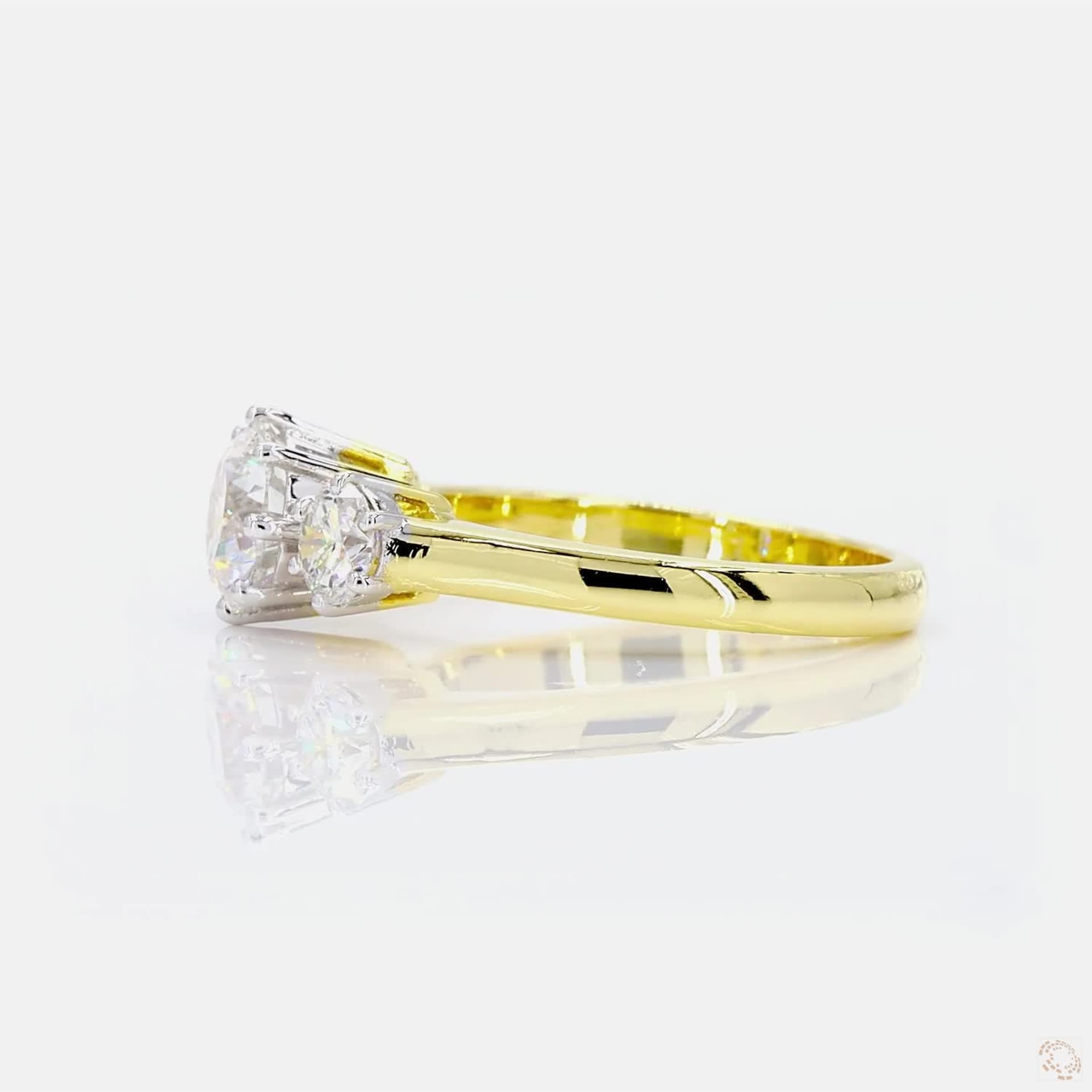 Three-Stone Round Solitaire Ring