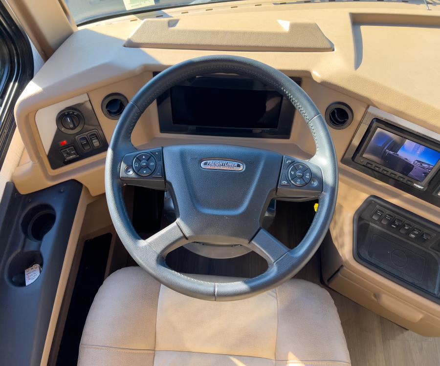2023 Newmar KOUNTRY STAR — rear three-quarter view