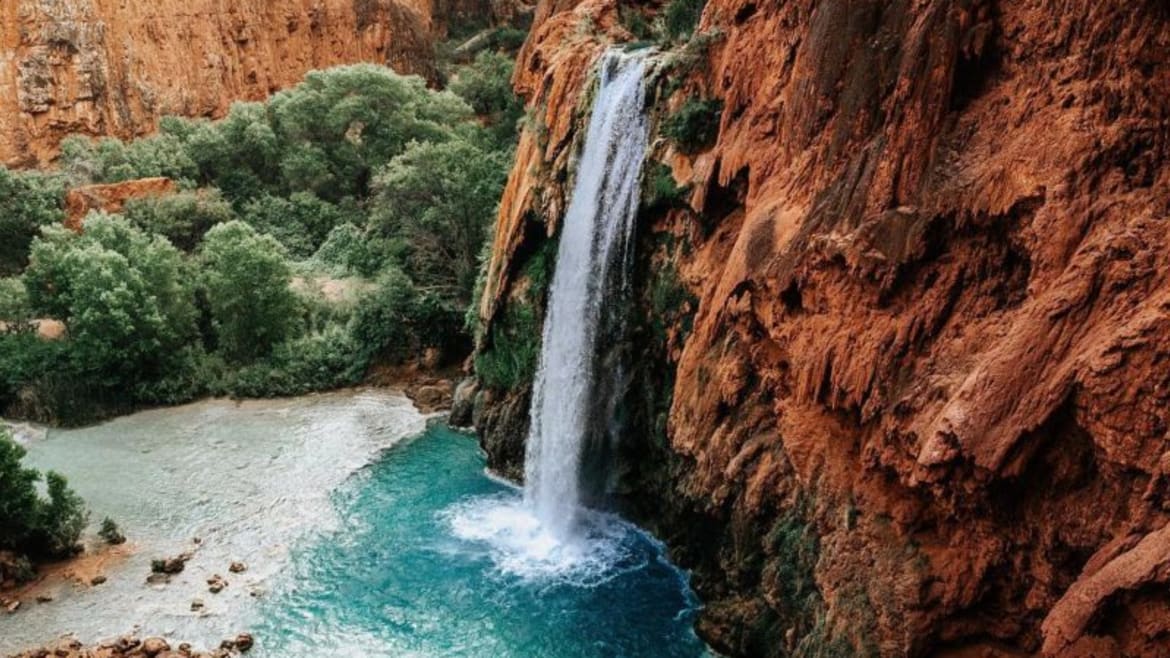 swim in emerald water, amazing waterfall