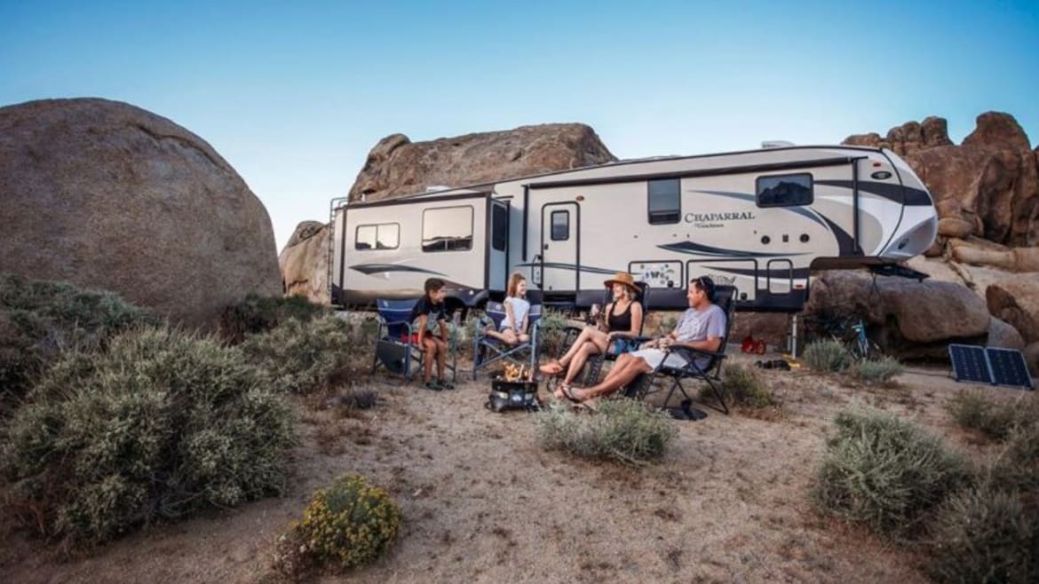 family traveling the US by RV