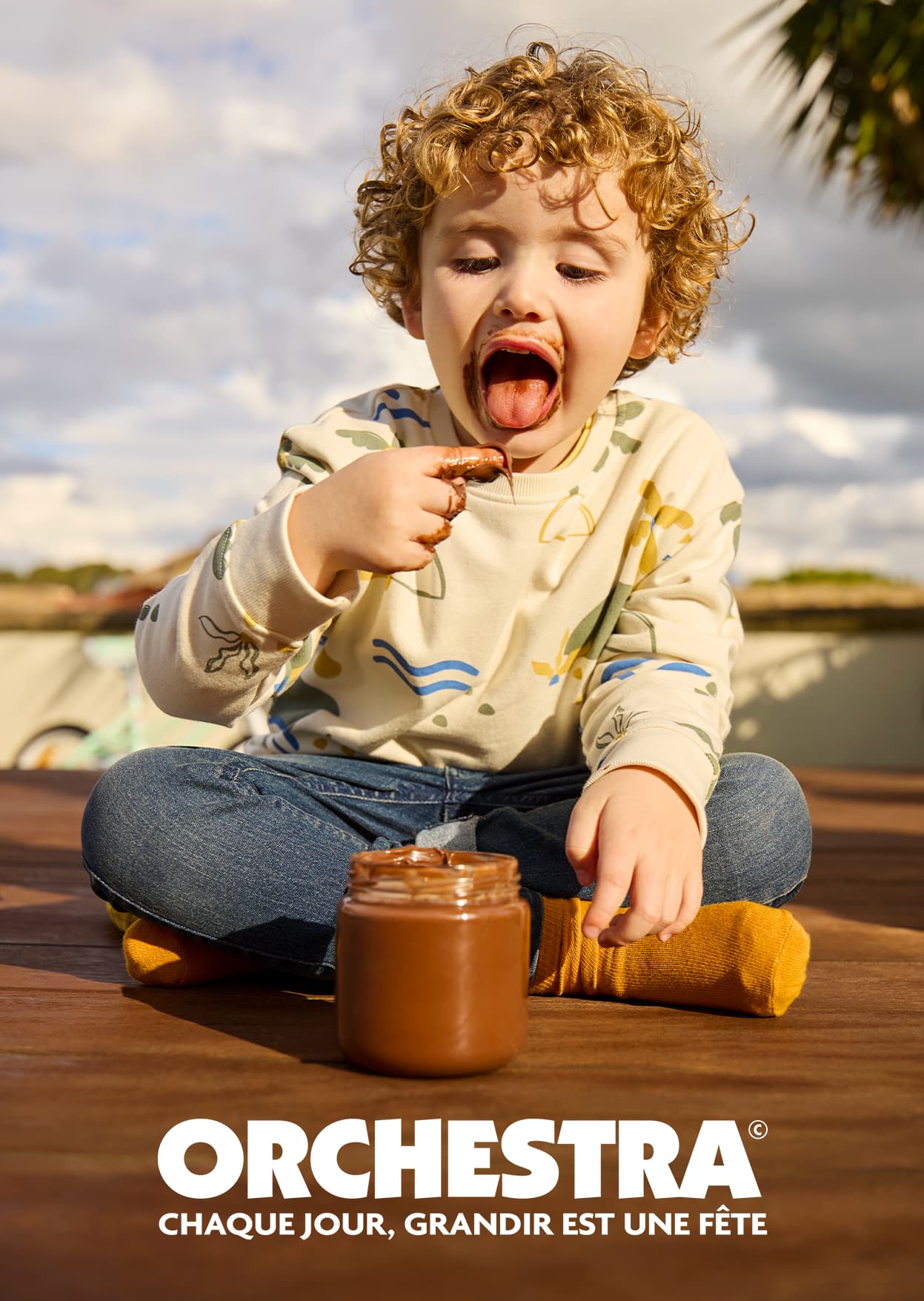 Orchestra, chaque jour, grandir est une fête. Visuel Chocolat.