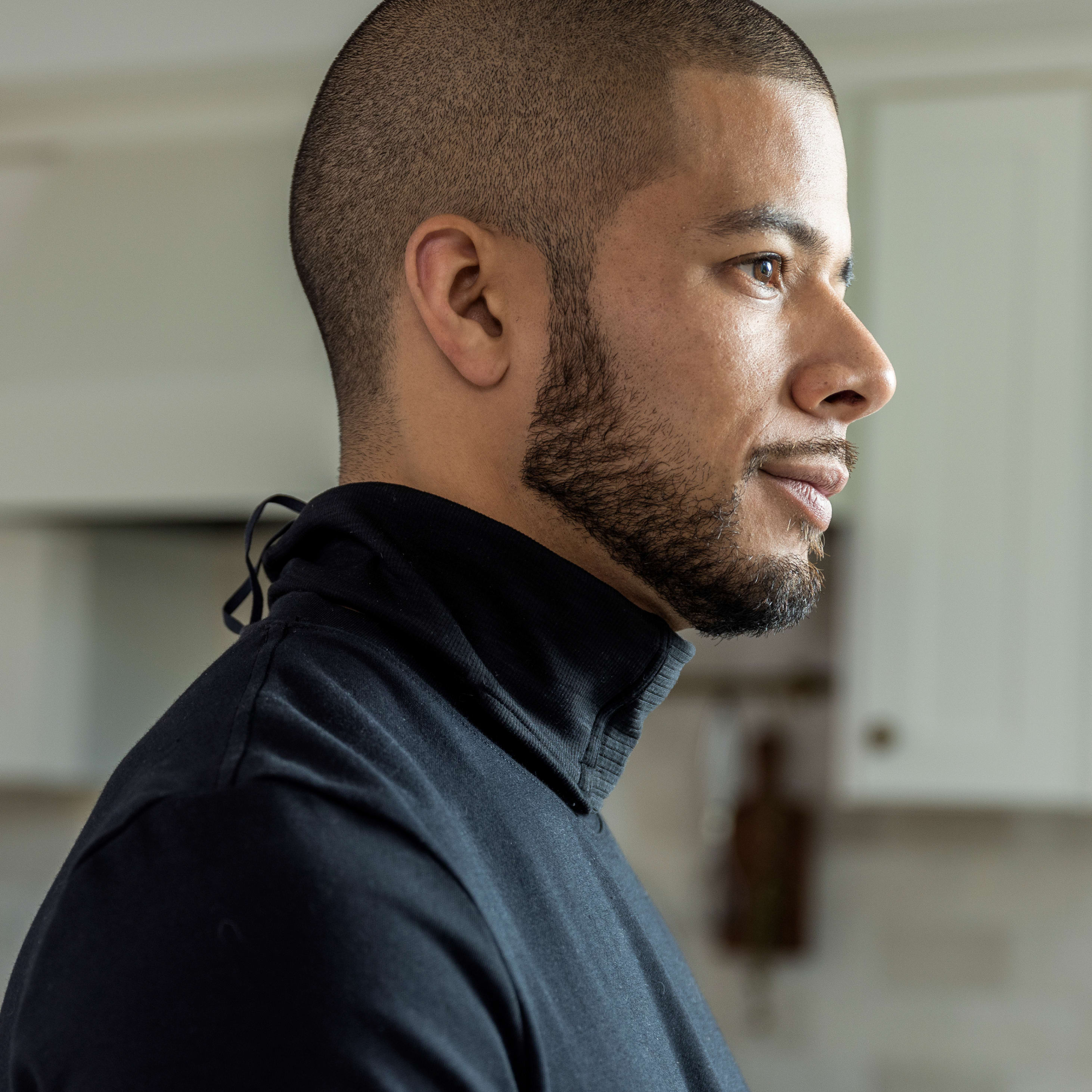 a close up of a person in a kitchen