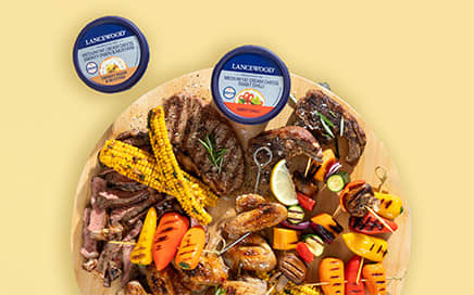 Heritage Day braai ideas with grilled meat, cheesy bread and Lancewood dips for sharing