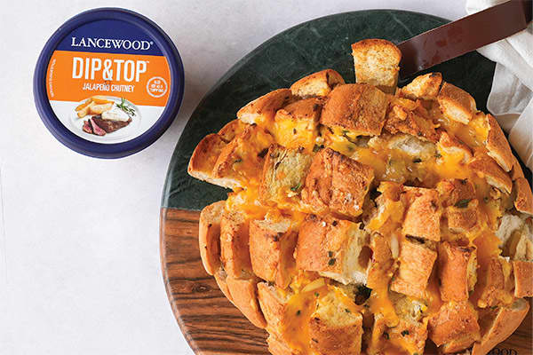 Stuffed cheesy boerewors bread baked golden brown – a festive Heritage Day boerewors recipe