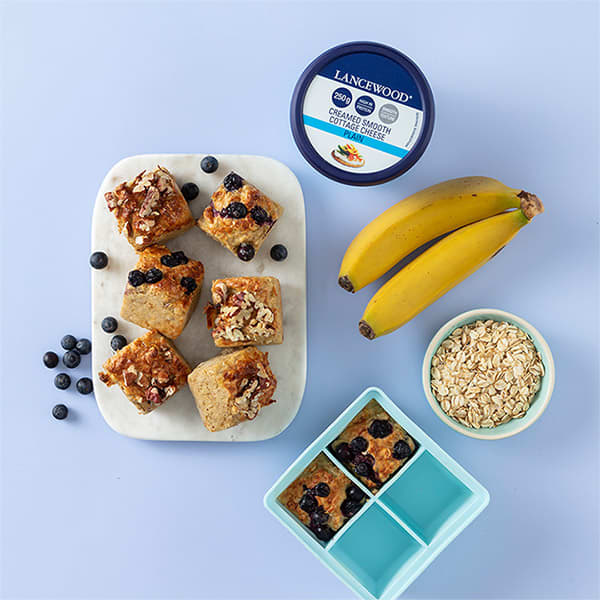 Best Breakfast baked oat bites with bananas, blueberries, oats, and LANCEWOOD® Cottage Cheese